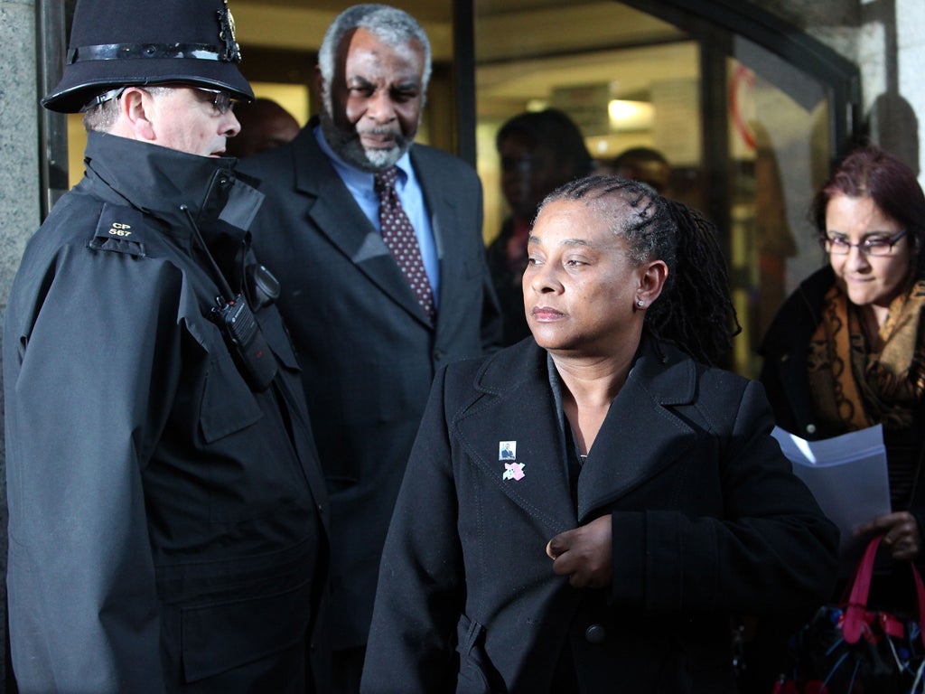 Doreen and Neville Lawrence emerge after the sentencing to give their separate statements to the media
