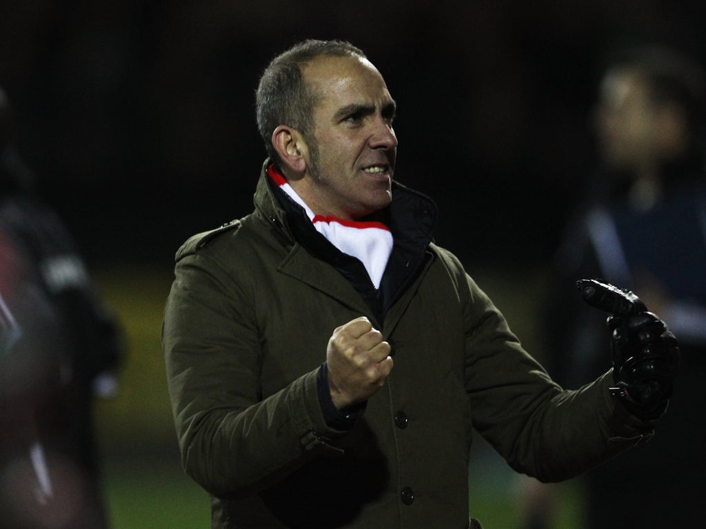 Paolo Di Canio manager of Swindon Town celebrates victory