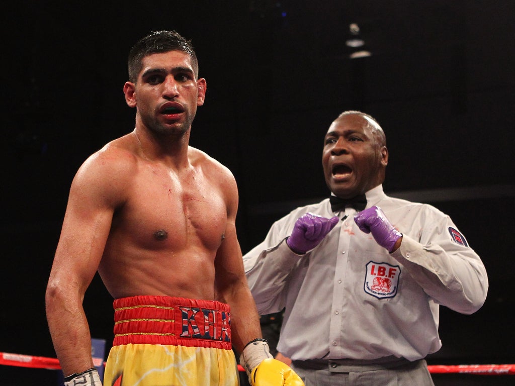 It seems that a mistake was made in the marking of round seven, in which Khan had a point deducted for pushing