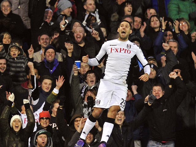 Fulham's Clint Dempsey celebrates scoring his second goal against Charlton