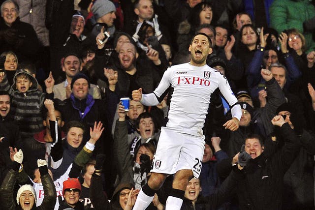 Fulham's Clint Dempsey celebrates scoring his second goal against Charlton