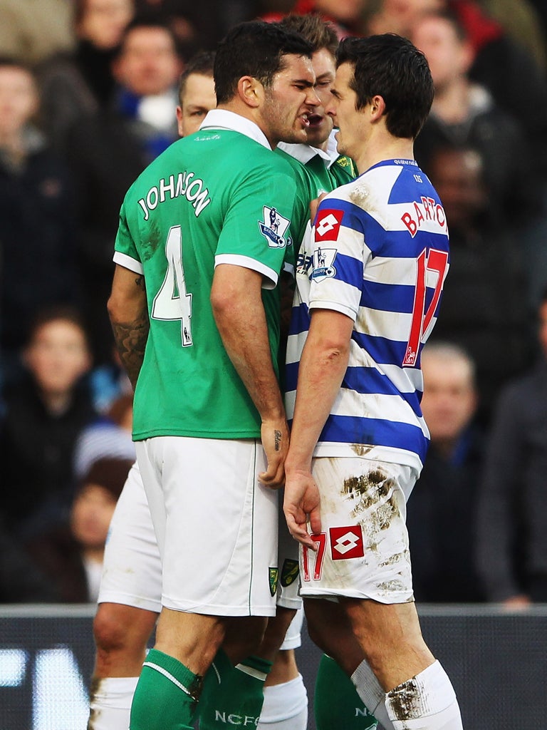 Joey Barton (right) clashes with Bradley Johnson before being sent off last week. An official with a monitor would have seen there was no headbutt