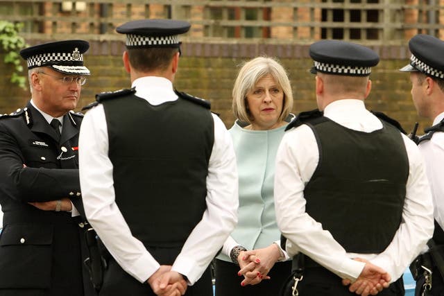 Theresa May is under pressure to abide by the Police Arbitration Tribunal findings