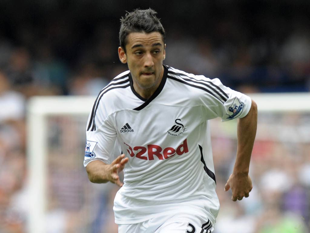 Swansea defender Neil Taylor has played down the speculation linking him with Arsenal
