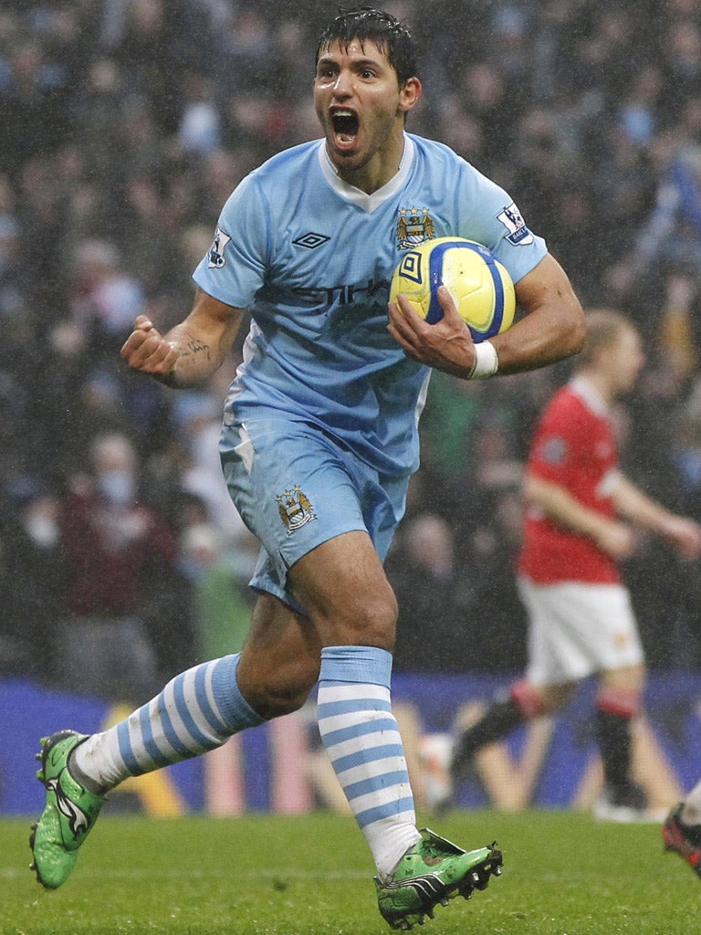 Sergio Aguero celebrates his goal against Manchester United