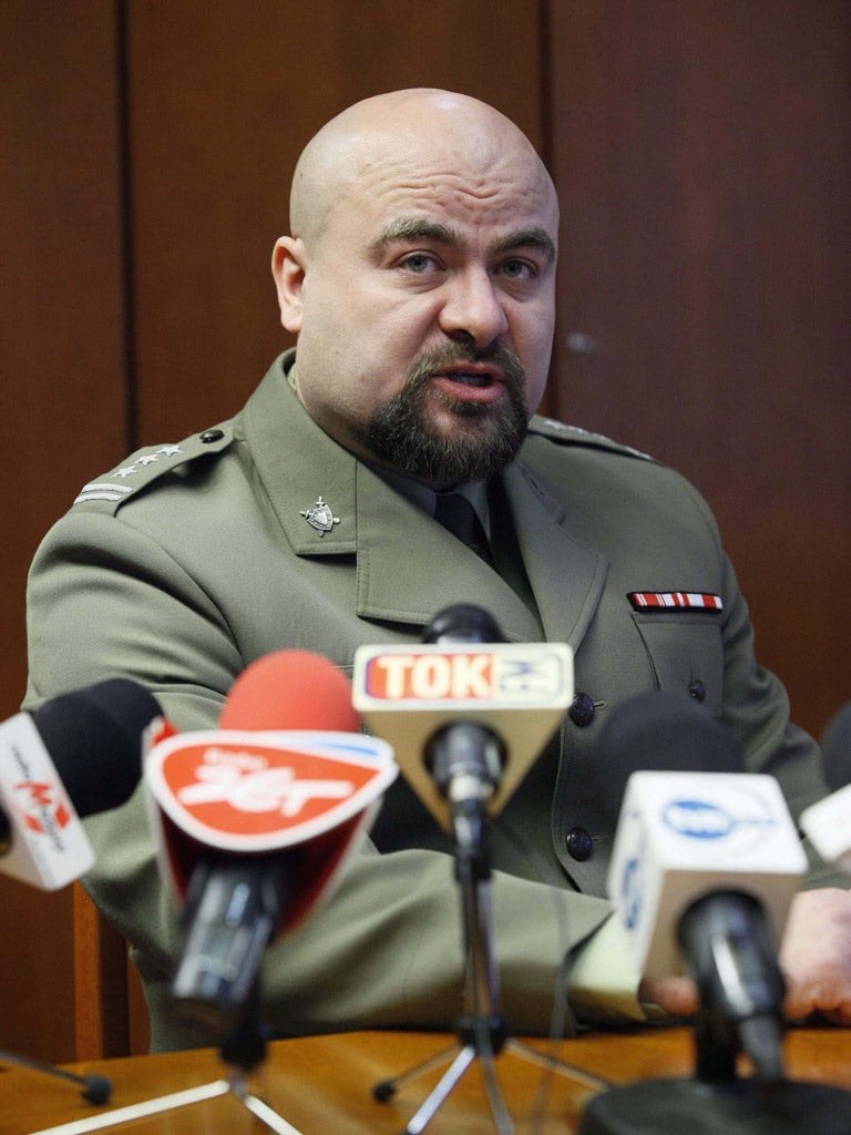 Colonel Mikolaj Przybyl speaks in Poznan yesterday