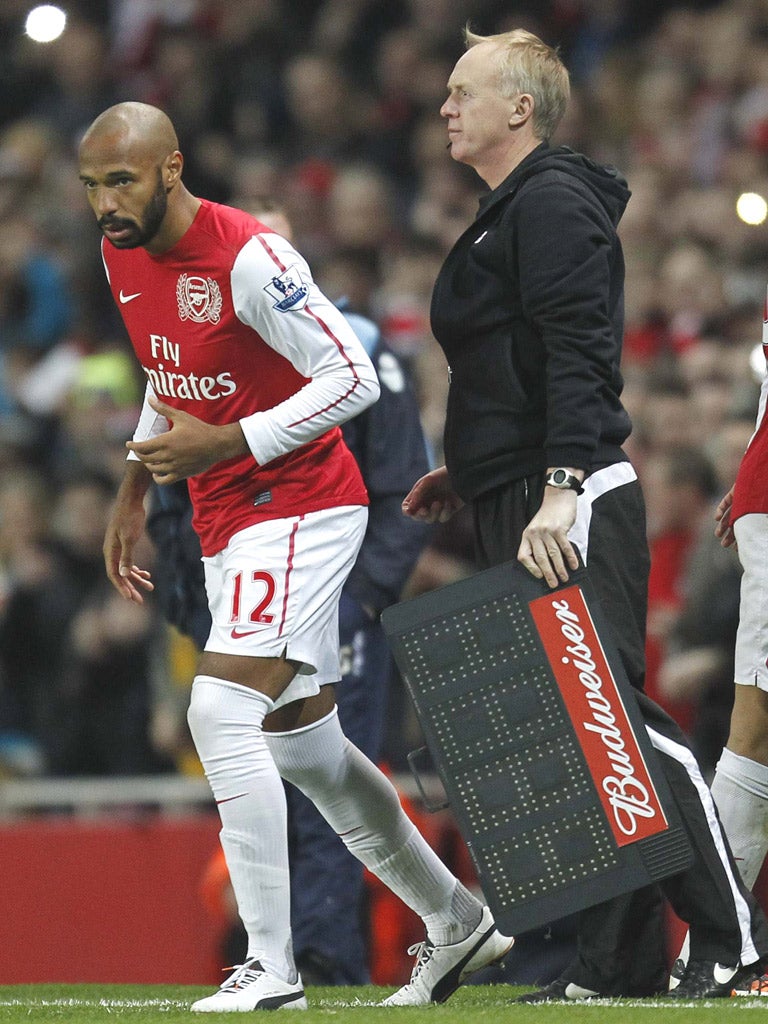 Thierry Henry takes his first step on to the Emirates turf last night