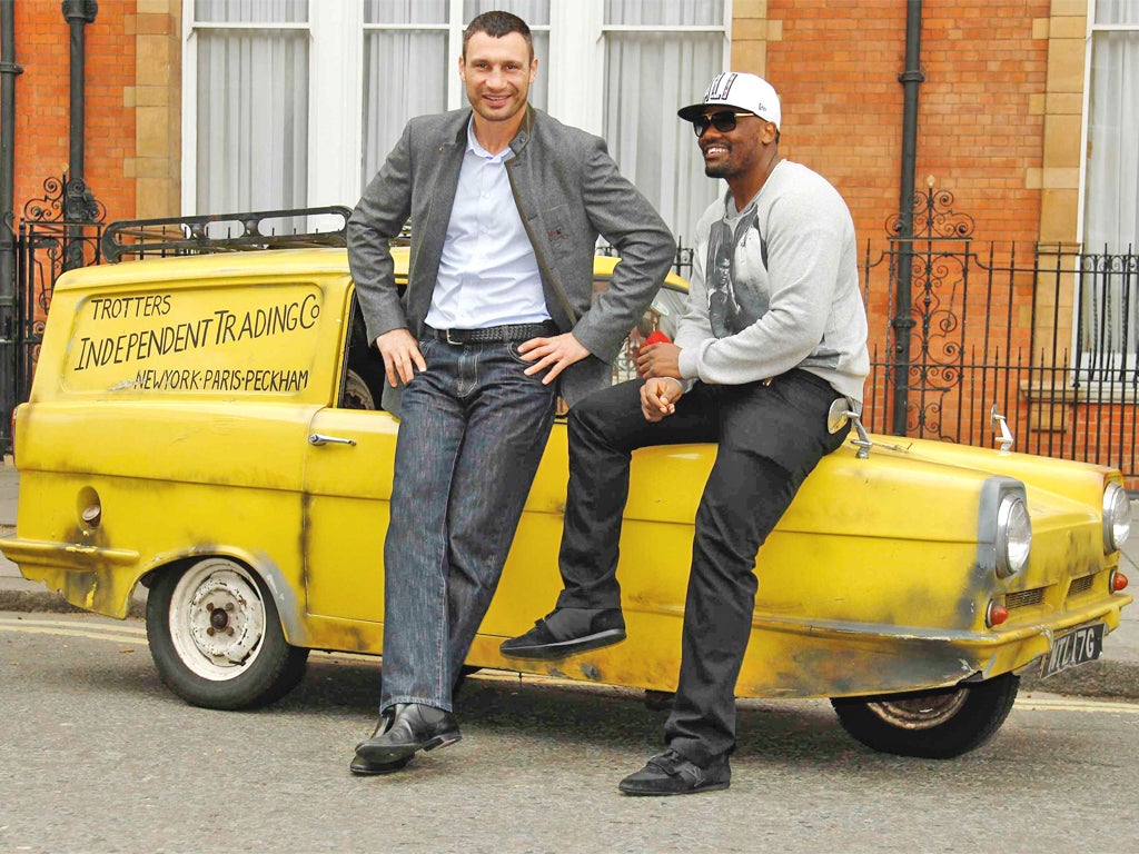 Dereck Chisora, a huge 'Only Fools and Horses' fan, poses with Vitali Klitschko in London. The pair fight next month in Munich