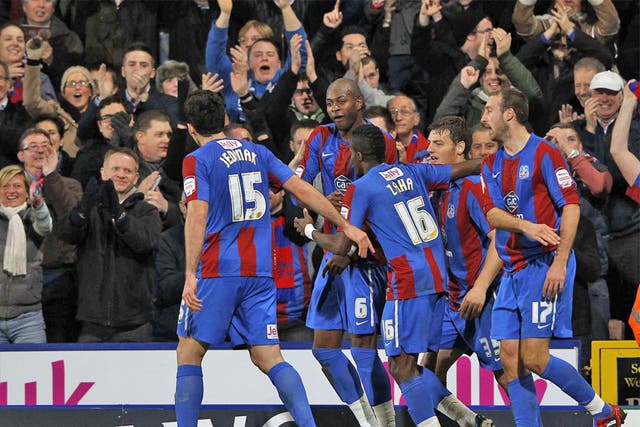 Crystal Palace's Anthony Gardner celebrates with his team mates after scoring against Cardiff
