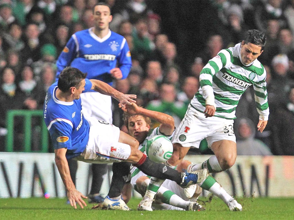 Lee McCulloch tackles Beram Kayal during last month's Old Firm game