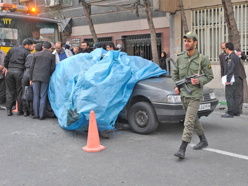 Nuclear scientist Mostafa Ahmadi Roshan's bombed car after the attack