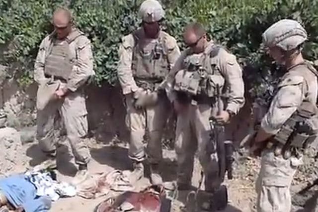 US marines allegedly urinating on corpses