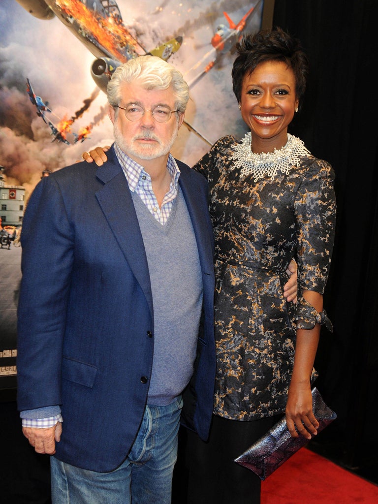 George Lucas and partner Mellody Hobson at the premiere of Red Tails in New York
