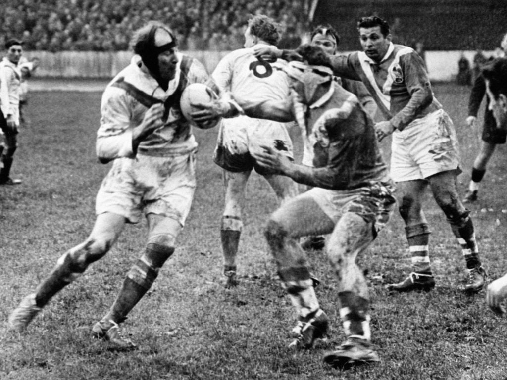 Pawsey, left, prepares to take on France's François Rinaldi in England's 7-5 win at Odsal Stadium, Bradford in 1953
