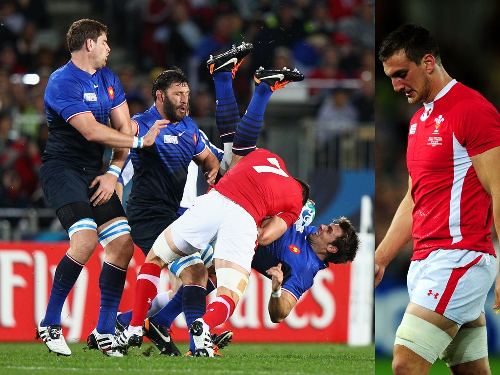 Wales captain Sam Warburton (right) was sent off for a dangerous tackle on France's Vincent Clerc