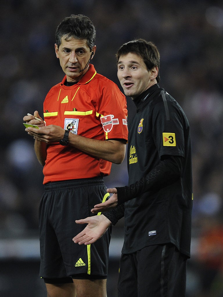 Barcelona's Leo Messi is booked during their latest disappointing La Liga display on the road, a 1-1 draw with Espanyol
