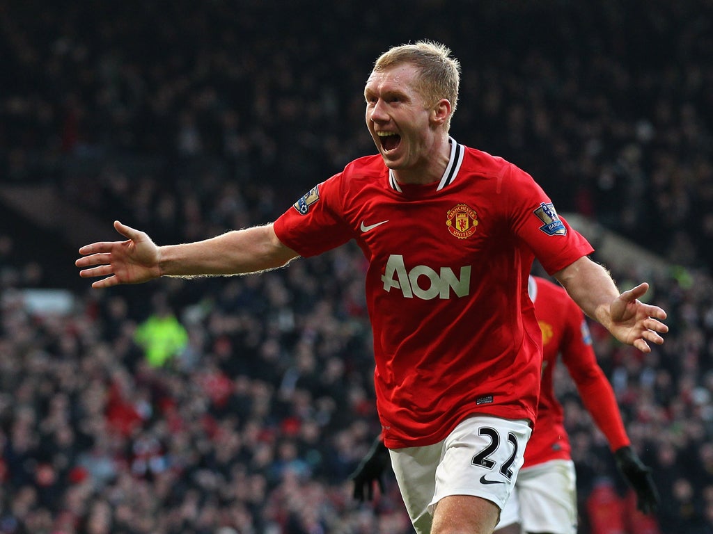 Paul Scholes of Manchester United celebrates after scoring the opening goal