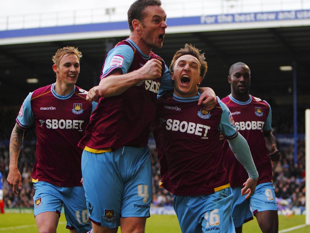 Mark Noble celebrates scoring after West Ham were awarded a penalty