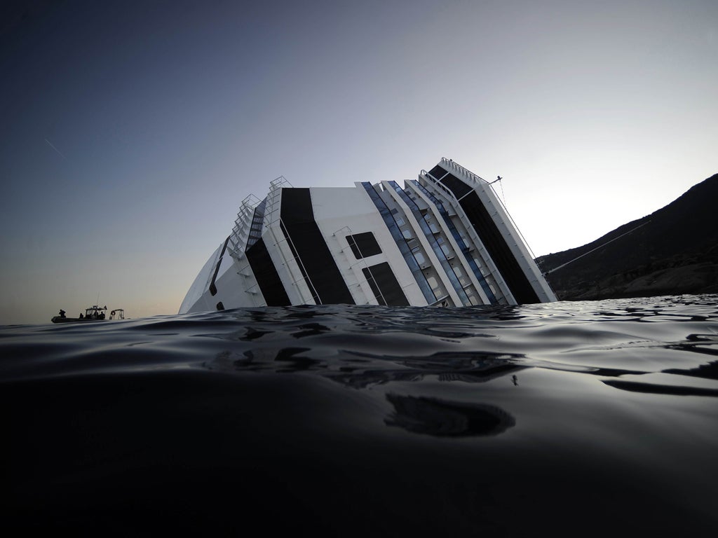 Captain Held As Cruise Ship Hits Rock And Sinks The