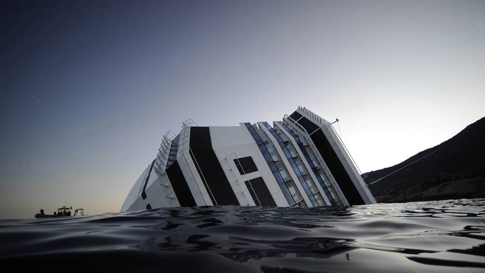 Captain Held As Cruise Ship Hits Rock And Sinks The