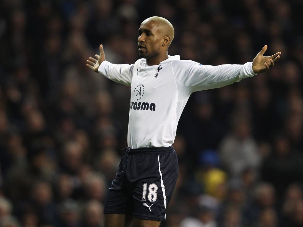 Tottenham striker Jermain Defoe reacts to a missed chance