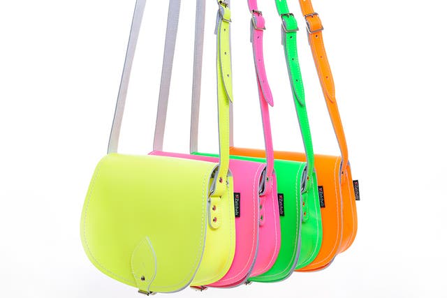 We Love: The new satchel - The geek-chic favourite has been knocked off its pedestal by something much more at home with the horsey set. Saddle bags are set to be everywhere this summer, so stand out from the crowd with a neon number. £55, zatchels.com