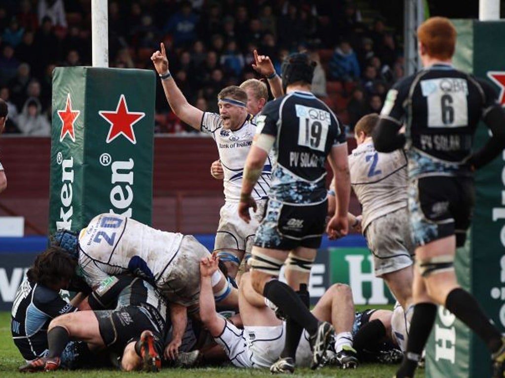 Leinster's Jamie Heaslip celebrates Isaac Boss's try yesterday