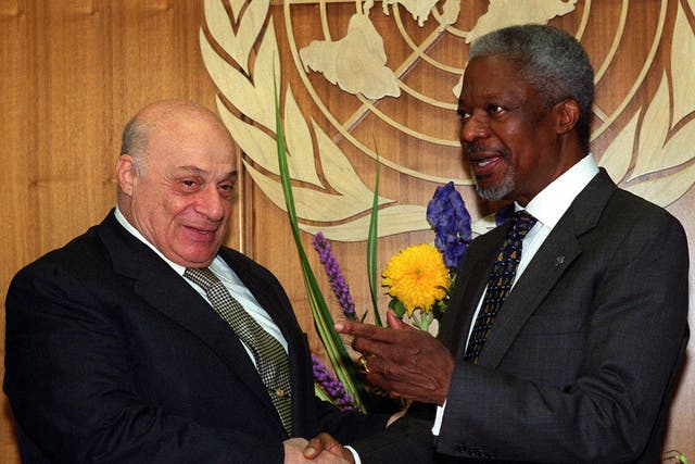 Denktash, left, meets the then UN Secretary-General Kofi Annan at the United Nations in 2000 