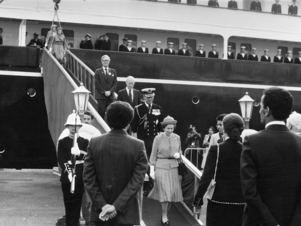 The Queen and Prince Philip disembark from the royal yacht 'Britannia' on a visit to Algeria in 1980