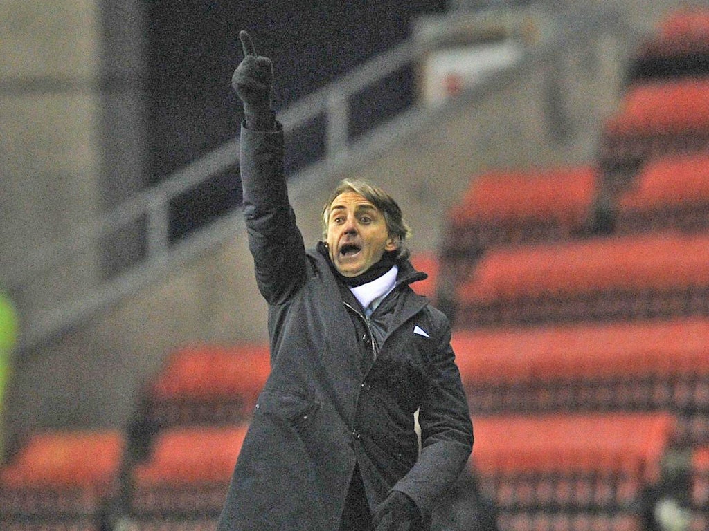 Roberto Mancini admits having worries over City's desire