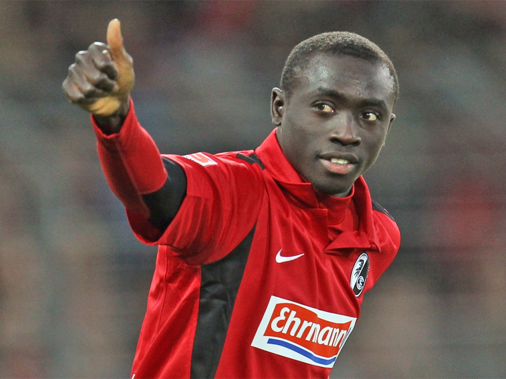 Senegal striker Papiss Cissé is set to join Newcastle for £8m