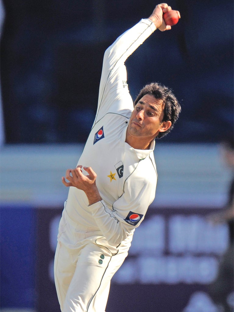 Ajmal: 'I am just getting on with my bowling'