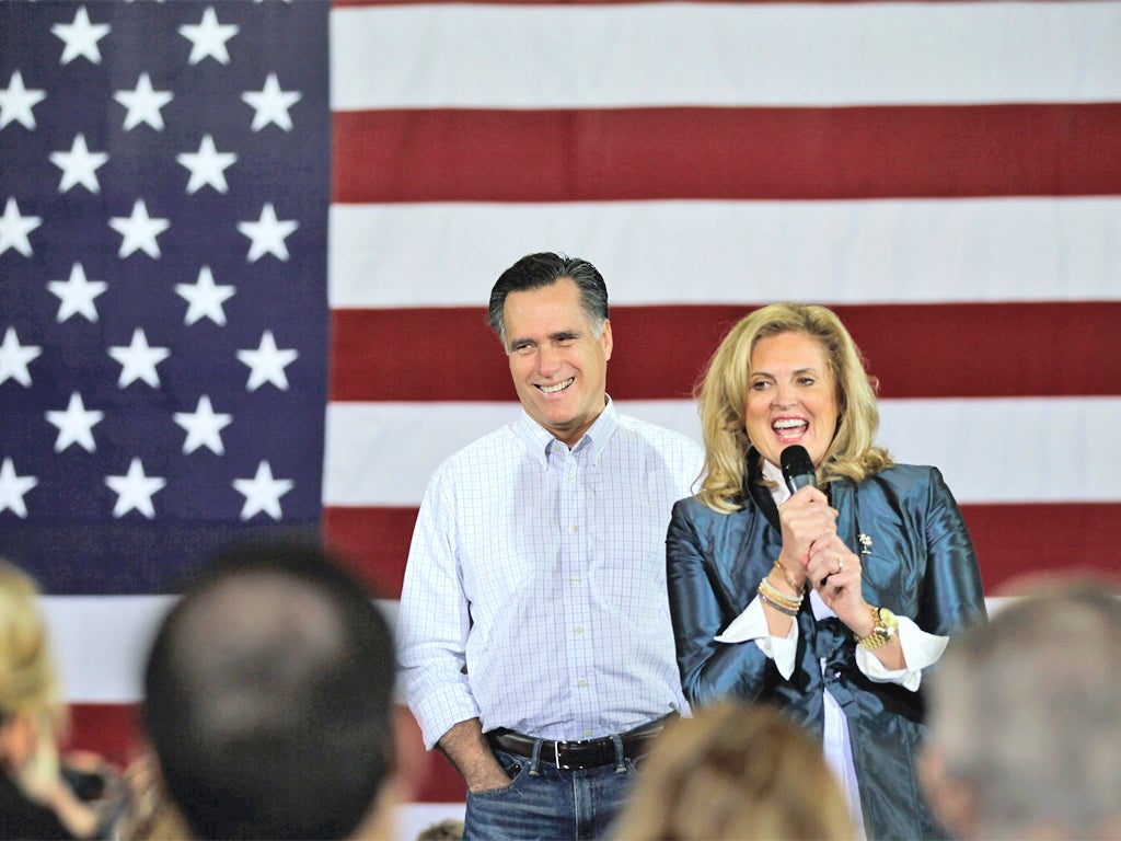 Mitt Romney shares the stage with his wife Ann at a campaign rally in Florence, South Carolina, yesterday