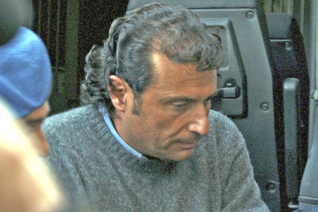 Francesco Schettino, the captain of the Costa Concordia, leaves court in Grosseto yesterday