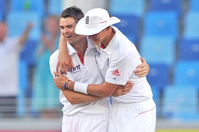 James Anderson gets a Stuart Broad hug after taking Abdur Rehman's wicket