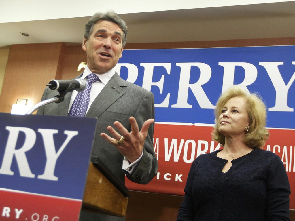Rick Perry, accompanied by his wife, Anita, announces he is
dropping out of the race for the Republican nomination