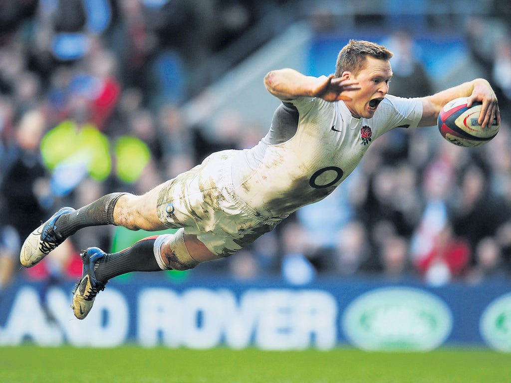 Chris Ashton dives over to score a try for England, in what
has become his trademark style