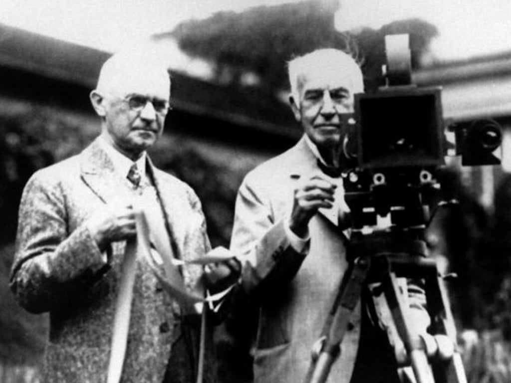 George Eastman, left, who founded Kodak in 1892, and
Thomas Edison pose with their inventions in this late-1920s photograph