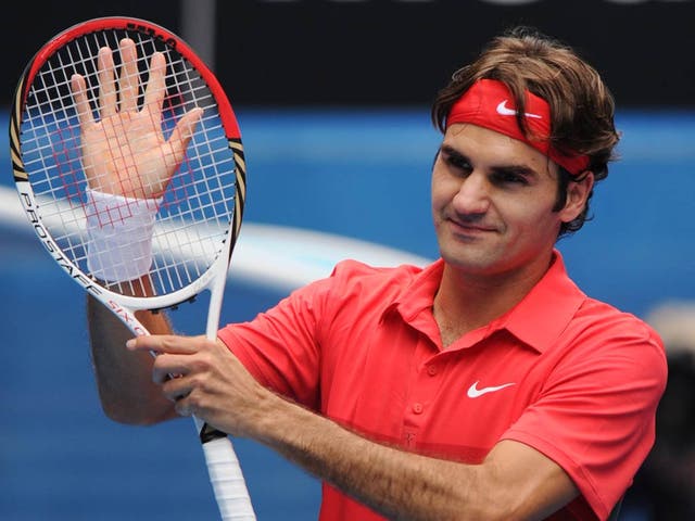 Roger Federer moves into the fourth round