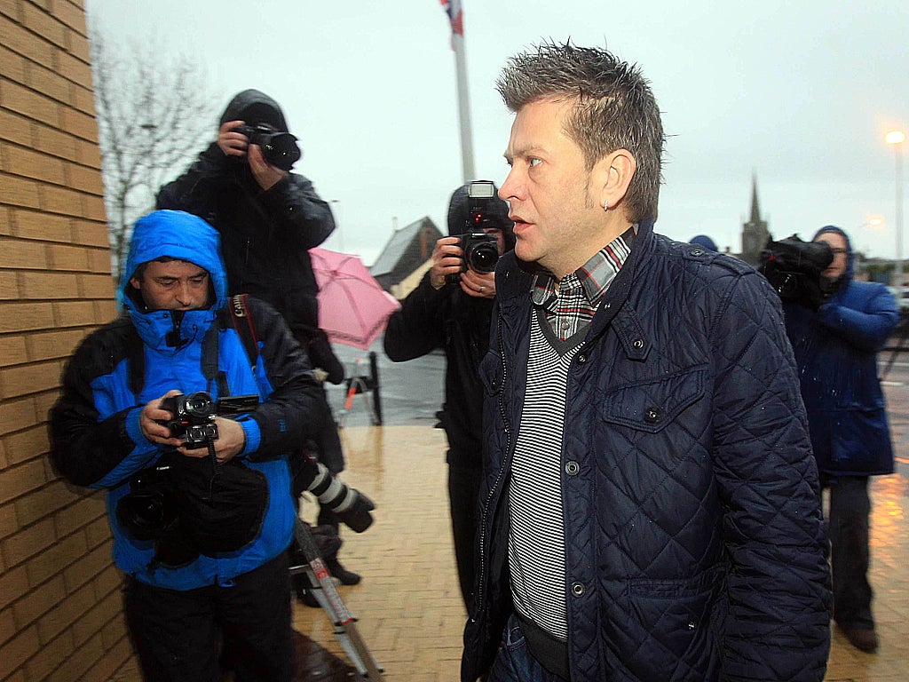 Brian Shivers arrives at Antrim Courthouse during the trial