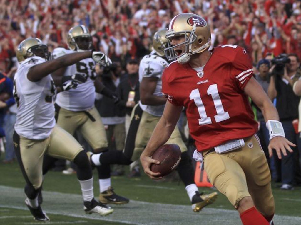 Joy for San Francisco's Alex Smith as he scores a fourth-quarter
touchdown against New Orleans Saints