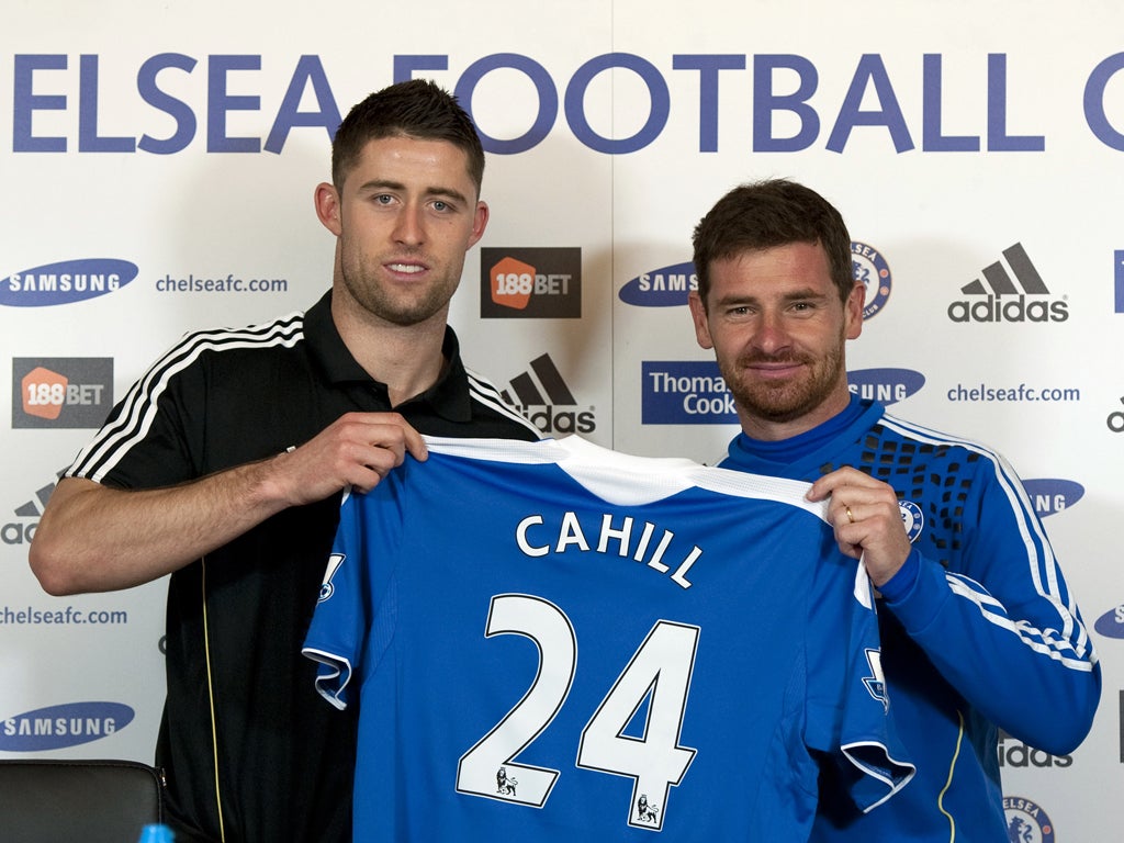 Gary Cahill (left) with Andre Villas-Boas at Cobham yesterday