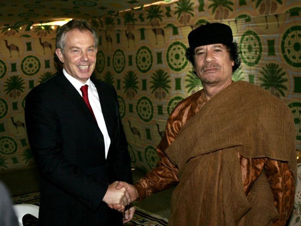 Former Prime Minister Tony Blair meets Colonel Muammar Gaddafi during a trip to Libya in 2007