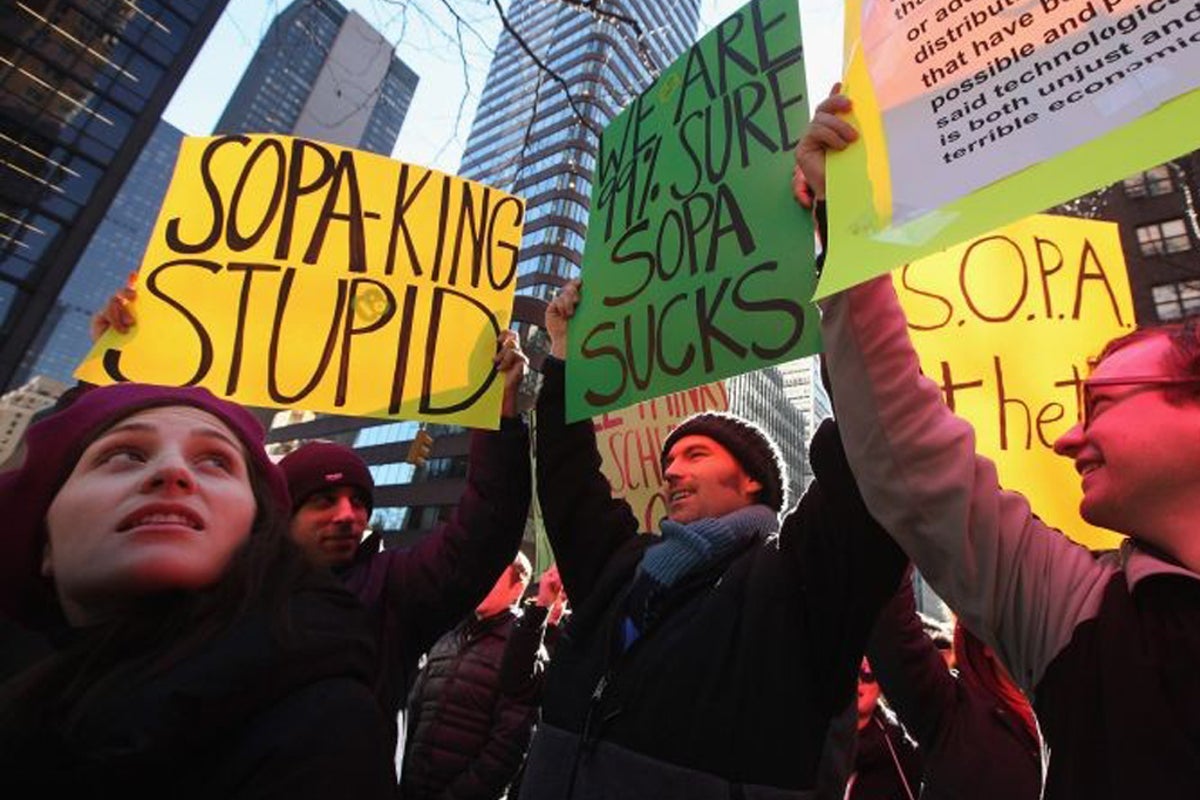 Web protest succeeds in halting anti-piracy bills | The Independent ...