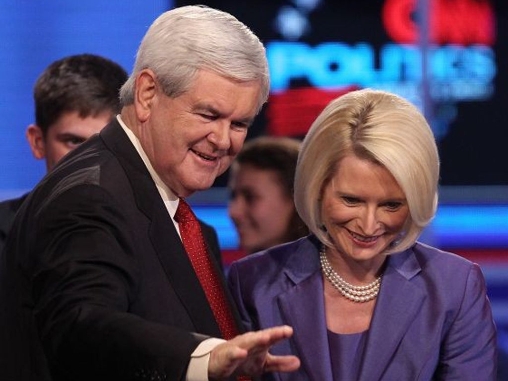 Republican presidential candidate and former Speaker of the House Newt Gingrich meets supporters with wife Callista