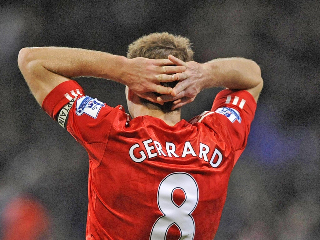 Steven Gerrard reacts during the match against Bolton Wanderers