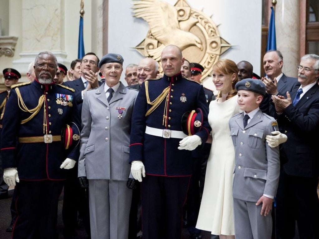 (Front row from left) John Kani portrays General Cominius, Vanessa Redgrave portrays Volumina, Ralph Fiennes portrays Caius Martius, Jessica Chastain portrays Virgilia and Henry Fenn portrays Young Martius in a scene from Coriolanis