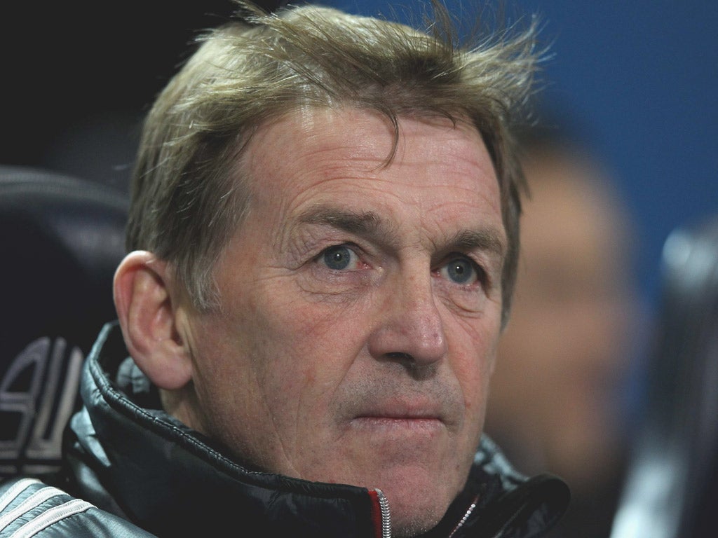 Kenny Dalglish watches Liverpool’s slump against
Bolton