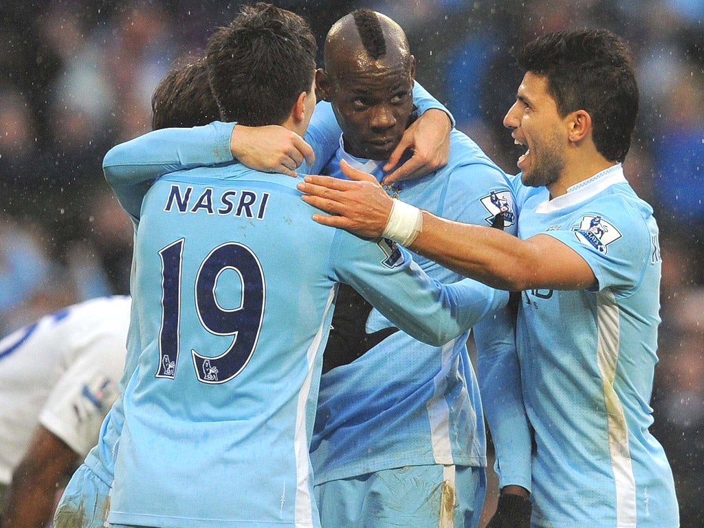 Mario Balotelli celebrates his goal