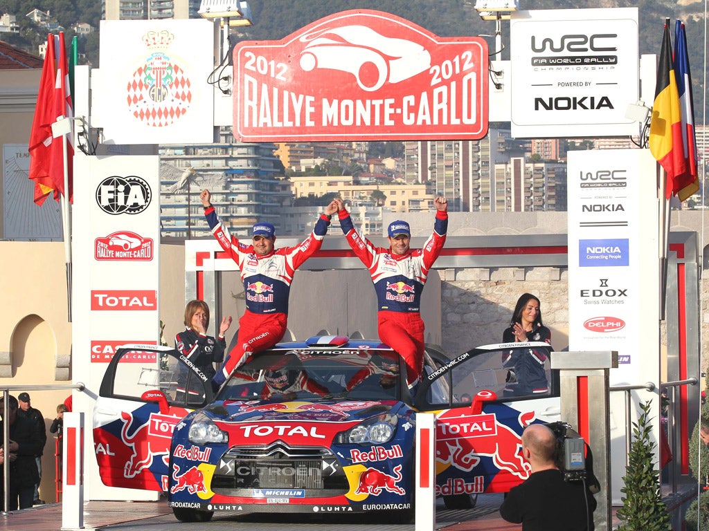 Sébastien Loeb (right) and co-driver Daniel Elena celebrate victory in Monte Carlo as the Frenchman bids for a record ninth world title
